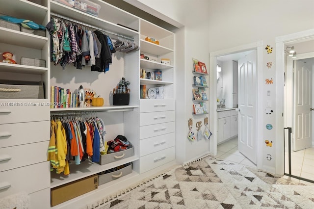 304 Andover Ct, Boynton Beach, FL 33436 - spacious closet featuring tile patterned floors
