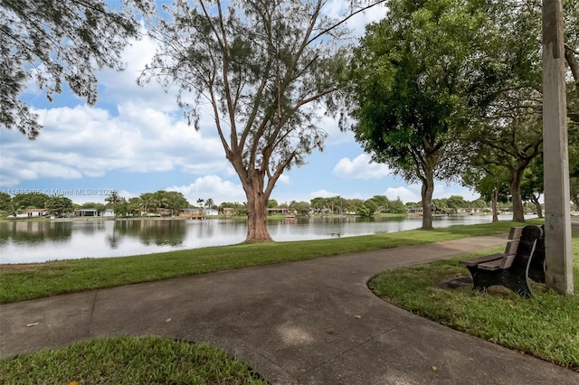 10391 Jasmine Ct, Pembroke Pines, FL 33026 - view of community featuring a water view and a yard