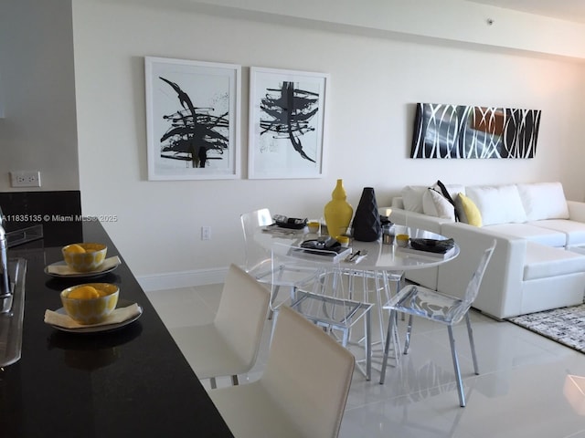1871 NW S River Dr Unit 1904, Miami, FL 33125 - dining space with tile patterned floors and baseboards