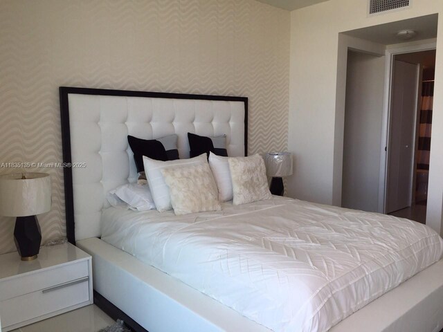 1871 NW S River Dr Unit 1904, Miami, FL 33125 - bedroom featuring wallpapered walls