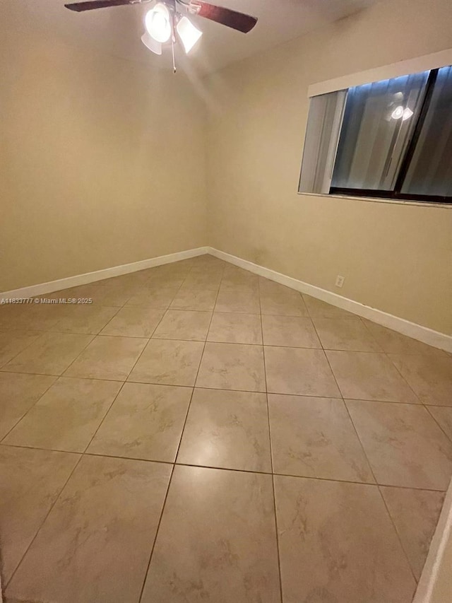 5012 SW 40th Ave Unit 5012, Fort Lauderdale, FL 33312 - tiled spare room with ceiling fan and baseboards