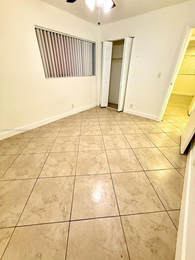 5012 SW 40th Ave Unit 5012, Fort Lauderdale, FL 33312 - unfurnished bedroom with tile patterned floors, a closet, and ceiling fan
