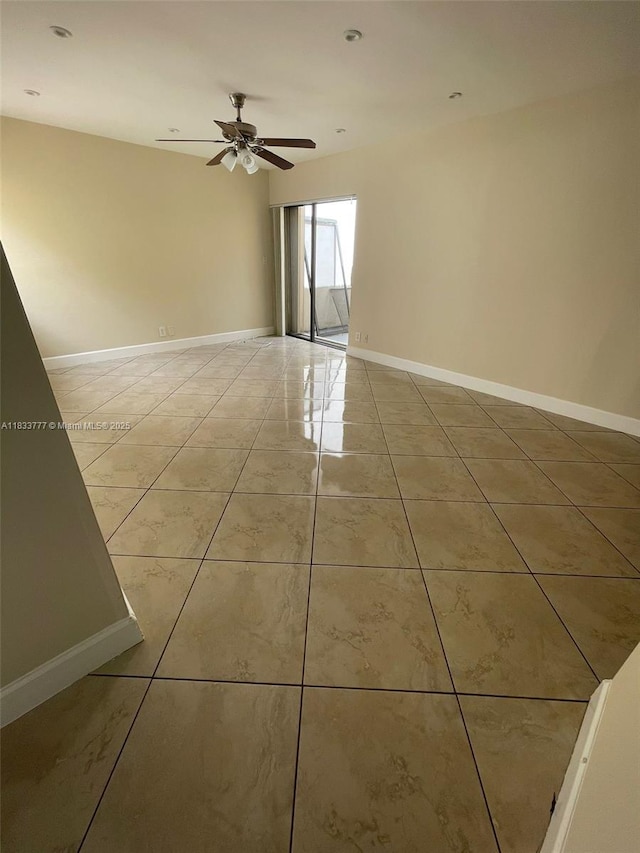 5012 SW 40th Ave Unit 5012, Fort Lauderdale, FL 33312 - empty room with ceiling fan and light tile patterned flooring