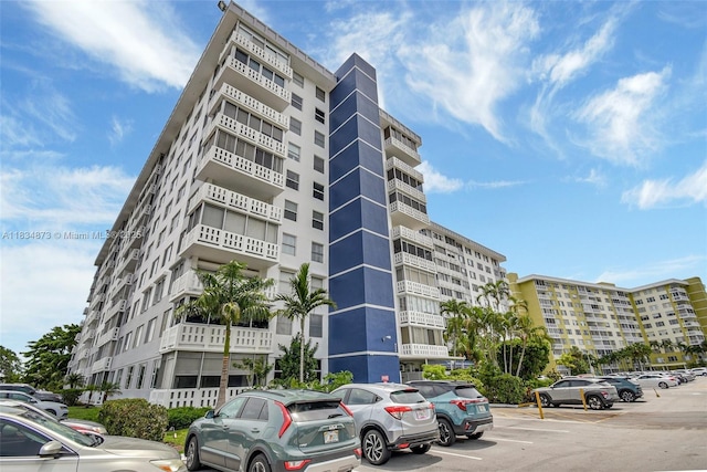 4350 Hillcrest Dr Unit 306, Hollywood, FL 33021 - view of apartment building / complex featuring uncovered parking