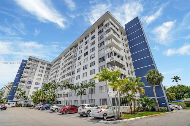 4350 Hillcrest Dr Unit 306, Hollywood, FL 33021 - view of apartment building / complex featuring uncovered parking