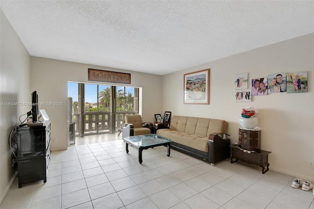4350 Hillcrest Dr Unit 306, Hollywood, FL 33021 - living room with a textured ceiling and light tile patterned floors