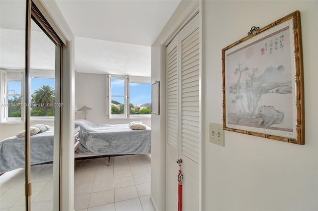 4350 Hillcrest Dr Unit 306, Hollywood, FL 33021 - bedroom featuring light tile patterned floors