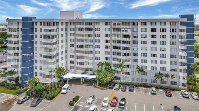 4350 Hillcrest Dr Unit 306, Hollywood, FL 33021 - view of apartment building / complex with uncovered parking