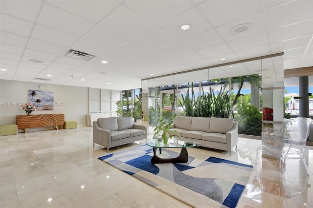 4350 Hillcrest Dr Unit 306, Hollywood, FL 33021 - common area featuring a paneled ceiling and floor to ceiling windows