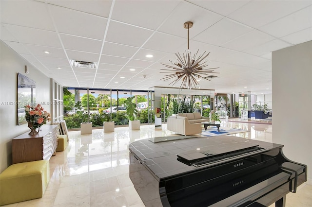 4350 Hillcrest Dr Unit 306, Hollywood, FL 33021 - building lobby featuring a paneled ceiling, recessed lighting, and expansive windows