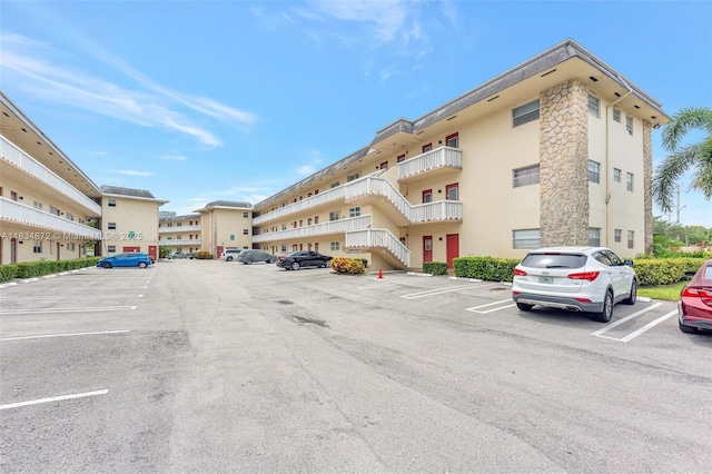 4341 NW 16th St Unit 203, Lauderhill, FL 33313 - view of building exterior featuring uncovered parking