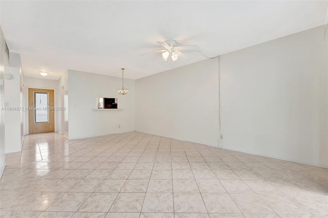 4341 NW 16th St Unit 203, Lauderhill, FL 33313 - unfurnished room with a ceiling fan, a chandelier, and light tile patterned floors