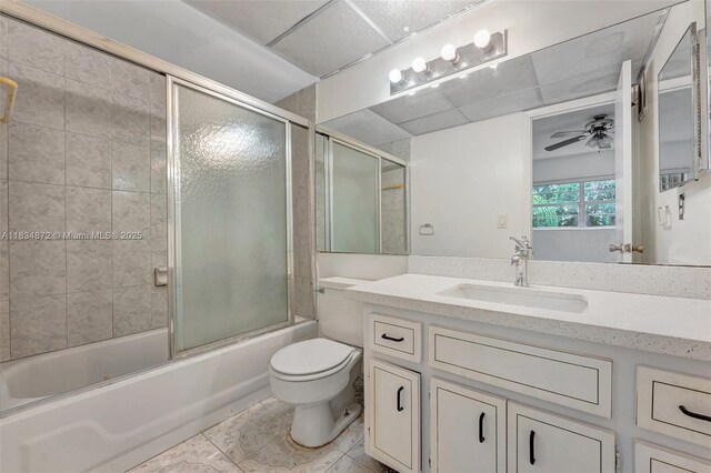 4341 NW 16th St Unit 203, Lauderhill, FL 33313 - bathroom featuring vanity, shower / bath combination with glass door, tile patterned floors, ceiling fan, and a paneled ceiling