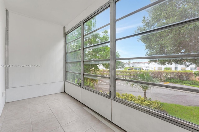 4341 NW 16th St Unit 203, Lauderhill, FL 33313 - unfurnished sunroom featuring tile patterned flooring