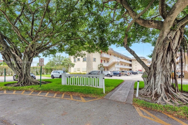 4341 NW 16th St Unit 203, Lauderhill, FL 33313 - view of front facade featuring a front yard