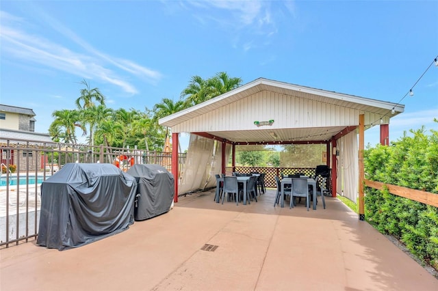 4341 NW 16th St Unit 203, Lauderhill, FL 33313 - fenced backyard featuring outdoor dining area, a grill, and a patio area