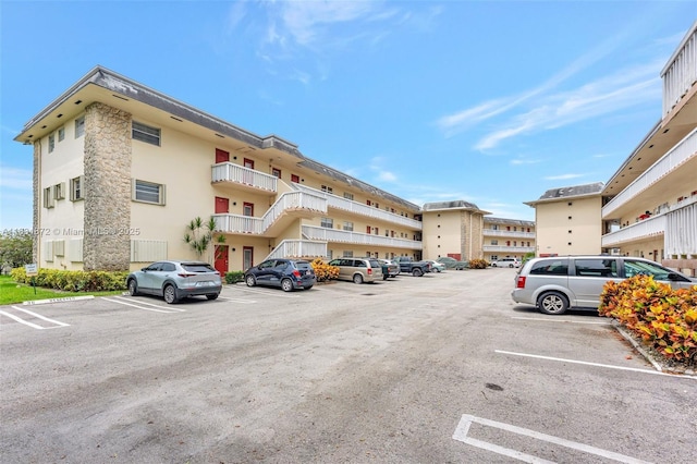 4341 NW 16th St Unit 203, Lauderhill, FL 33313 - view of property with uncovered parking