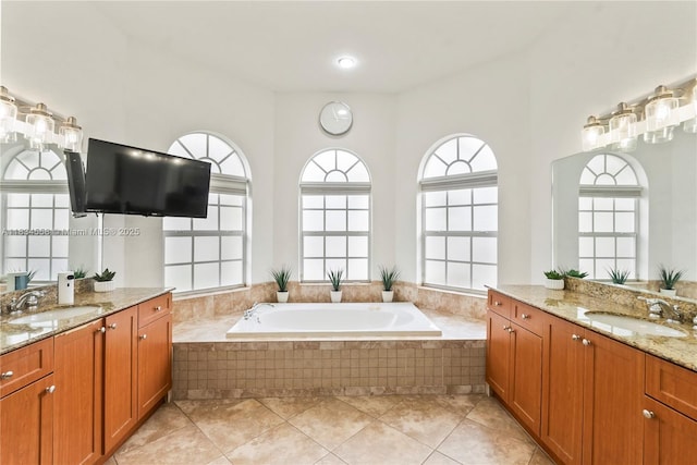 8346 SW 51st St, Davie, FL 33328 - bathroom featuring two vanities, a bath, and tile patterned flooring