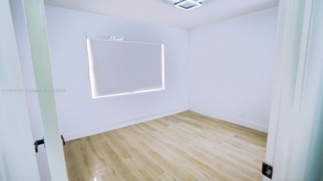9601 Sunrise Lakes Blvd Unit 311, Sunrise, FL 33322 - spare room featuring wood finished floors