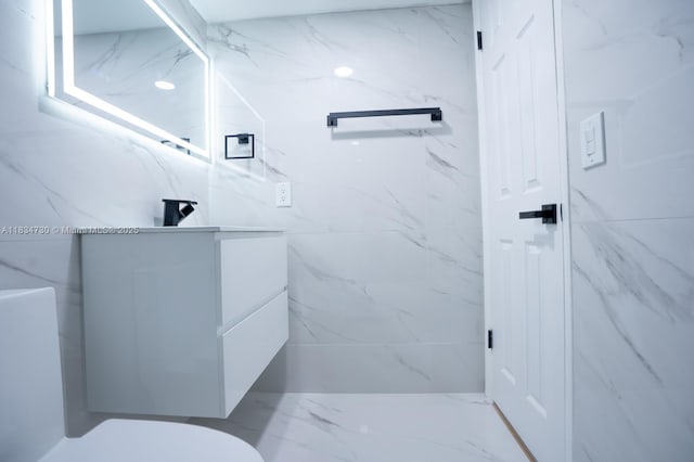 9601 Sunrise Lakes Blvd Unit 311, Sunrise, FL 33322 - bathroom with vanity and marble finish floors
