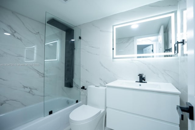 9601 Sunrise Lakes Blvd Unit 311, Sunrise, FL 33322 - bathroom featuring vanity, bathtub / shower combination, and tile walls
