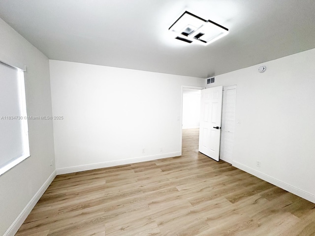 9601 Sunrise Lakes Blvd Unit 311, Sunrise, FL 33322 - spare room featuring light wood-style floors and baseboards