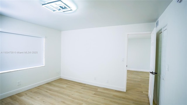 9601 Sunrise Lakes Blvd Unit 311, Sunrise, FL 33322 - spare room featuring light wood-style flooring and baseboards