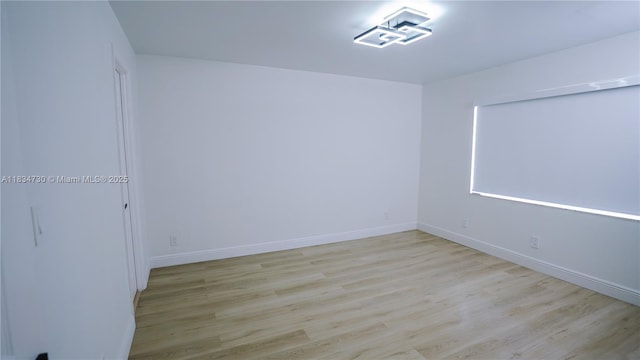 9601 Sunrise Lakes Blvd Unit 311, Sunrise, FL 33322 - spare room with wood finished floors and baseboards