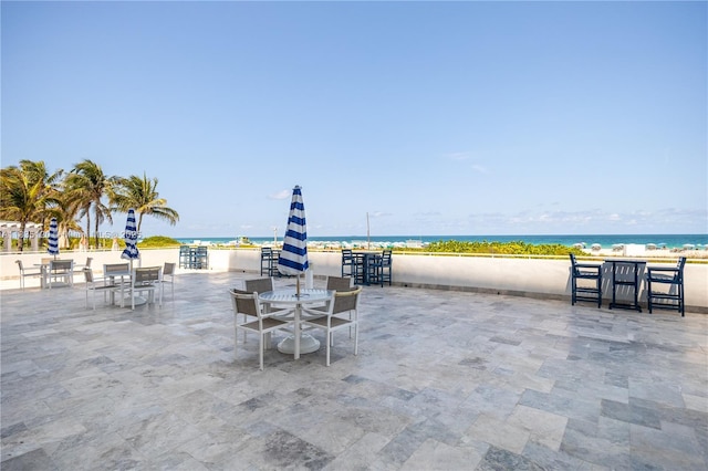 401 Ocean Dr Unit 1024, Miami Beach, FL 33139 - view of patio with view of water and beach and outdoor dining space