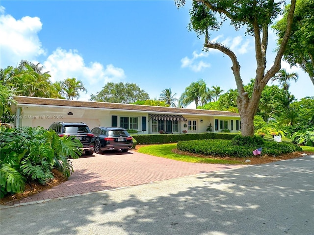 8225 SW 151st St, Palmetto Bay, FL 33158 - ranch-style home with a garage and decorative driveway