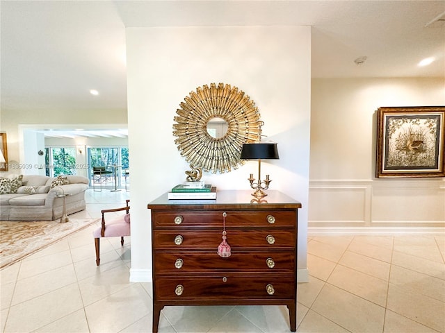 8225 SW 151st St, Palmetto Bay, FL 33158 - corridor featuring light tile patterned floors and a decorative wall