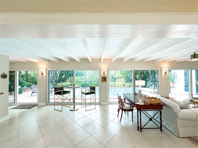 8225 SW 151st St, Palmetto Bay, FL 33158 - living room featuring beamed ceiling and light tile patterned floors