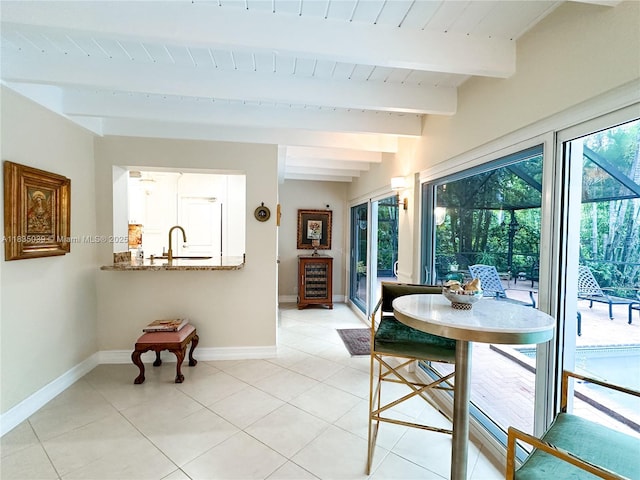 8225 SW 151st St, Palmetto Bay, FL 33158 - dining area with beamed ceiling and light tile patterned floors