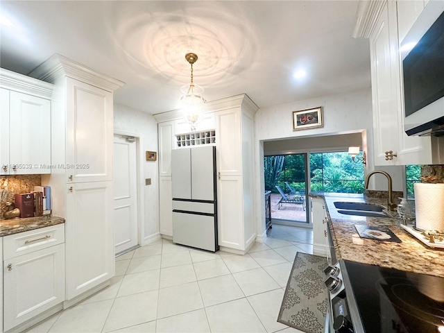 8225 SW 151st St, Palmetto Bay, FL 33158 - kitchen featuring white appliances, white cabinets, stone countertops, and light tile patterned floors