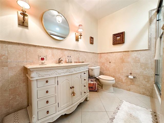 8225 SW 151st St, Palmetto Bay, FL 33158 - bathroom with tile patterned flooring, vanity, tile walls, and wainscoting