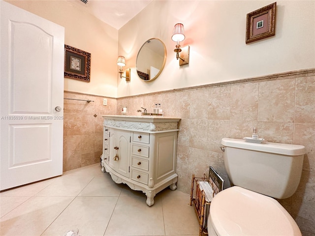 8225 SW 151st St, Palmetto Bay, FL 33158 - bathroom with vanity, tile walls, a wainscoted wall, and tile patterned floors