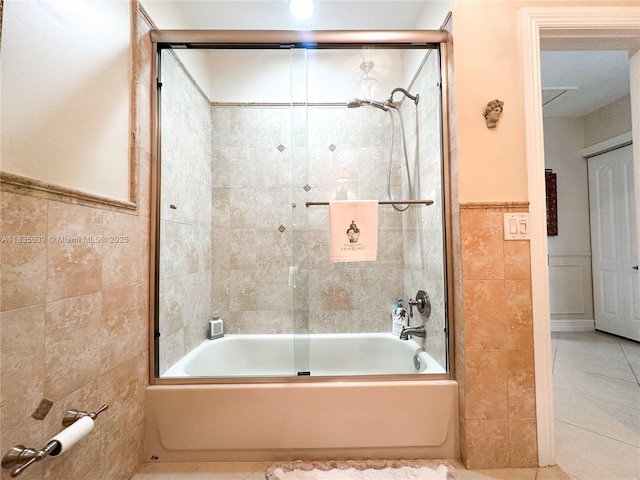 8225 SW 151st St, Palmetto Bay, FL 33158 - full bathroom with tile walls, tile patterned flooring, shower / bathtub combination, and wainscoting