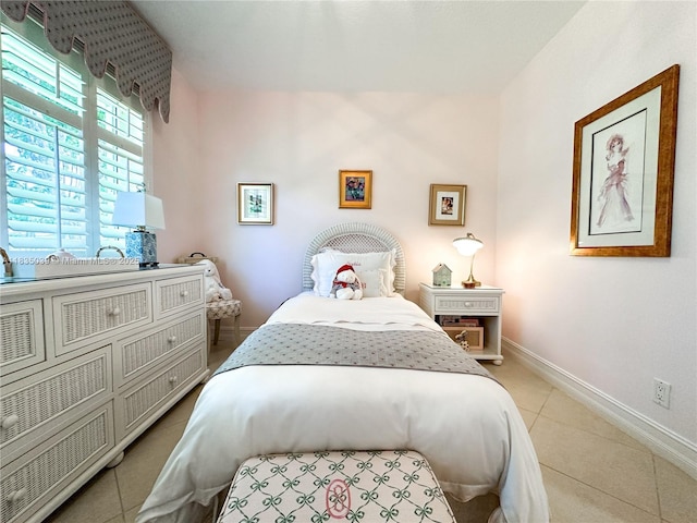 8225 SW 151st St, Palmetto Bay, FL 33158 - bedroom with light tile patterned flooring and baseboards