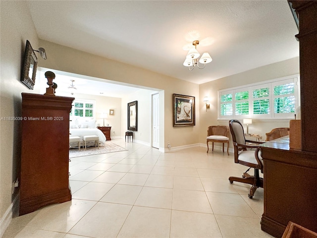 8225 SW 151st St, Palmetto Bay, FL 33158 - bedroom with a chandelier and light tile patterned floors
