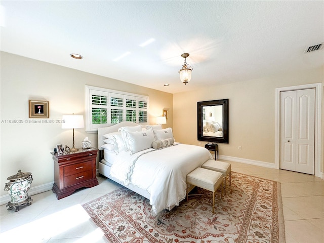 8225 SW 151st St, Palmetto Bay, FL 33158 - bedroom featuring light tile patterned floors and recessed lighting