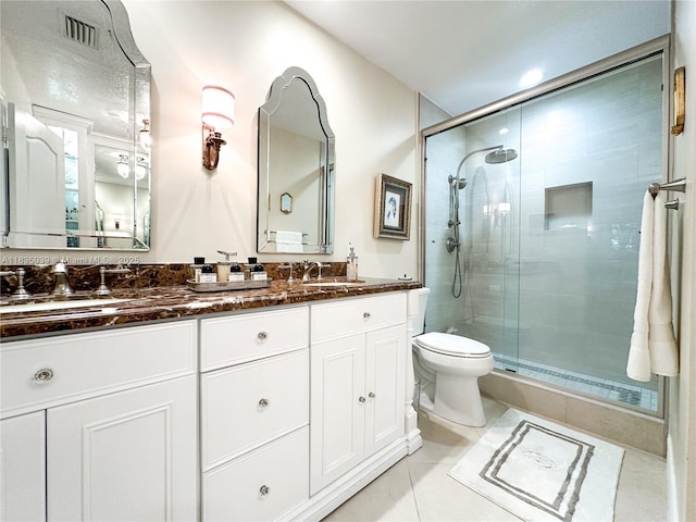 8225 SW 151st St, Palmetto Bay, FL 33158 - bathroom with a shower stall, double vanity, and tile patterned flooring