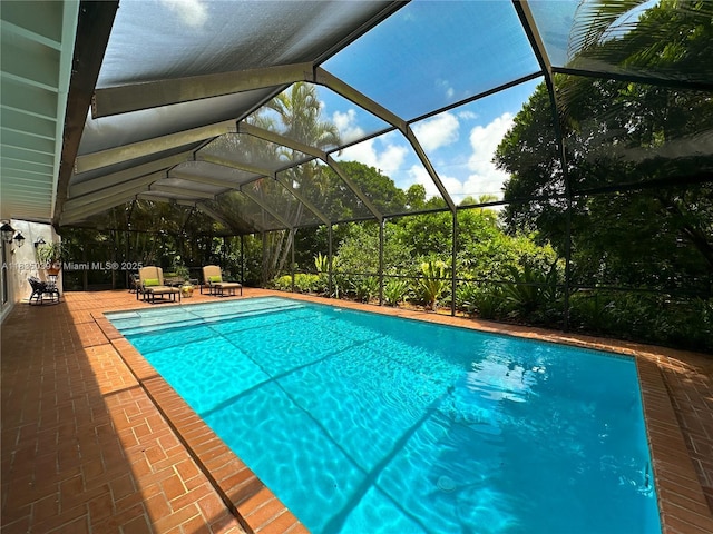 8225 SW 151st St, Palmetto Bay, FL 33158 - outdoor pool featuring a patio and a lanai