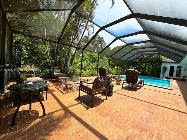8225 SW 151st St, Palmetto Bay, FL 33158 - view of patio / terrace with french doors, an outdoor pool, glass enclosure, and an outdoor living space