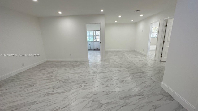 2251 NW 48th Ter Unit 214, Lauderhill, FL 33313 - unfurnished room with recessed lighting and light marble finish flooring