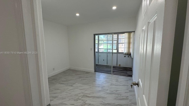 2251 NW 48th Ter Unit 214, Lauderhill, FL 33313 - empty room featuring light marble finish floors and recessed lighting