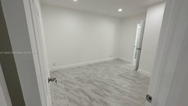2251 NW 48th Ter Unit 214, Lauderhill, FL 33313 - spare room featuring marble look tiles and recessed lighting
