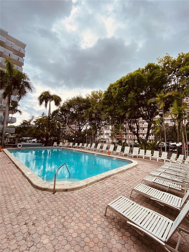 3545 NE 166th St Unit 805, North Miami Beach, FL 33160 - community pool with a patio area