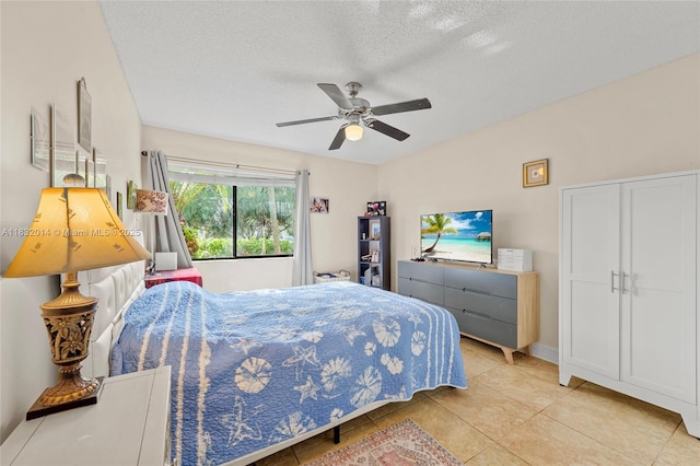17130 SW 93rd Ave, Palmetto Bay, FL 33157 - tiled bedroom with a textured ceiling and a ceiling fan