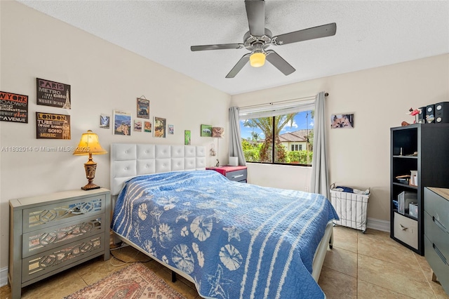 17130 SW 93rd Ave, Palmetto Bay, FL 33157 - tiled bedroom with a ceiling fan and baseboards