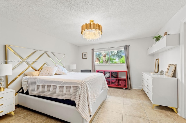 17130 SW 93rd Ave, Palmetto Bay, FL 33157 - bedroom with a chandelier, a textured ceiling, and light tile patterned floors